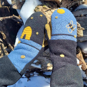 Fleece lined wool mittens in a variety of designs and colors.